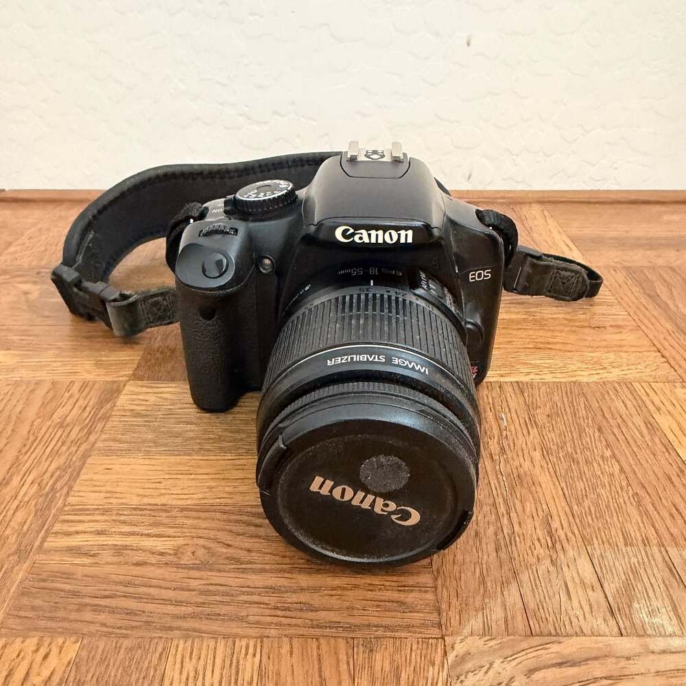 Canon EOS Rebel XSi 12.2MP DSLR Camera with 18-55mm IS Lens and Strap & Course